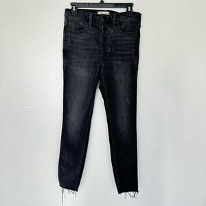 Black Madewell high rise skinny jeans in size 28 with button closure